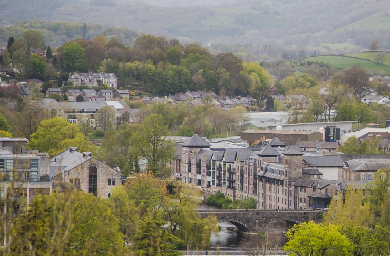 Rural town in the distance surrounded by hills