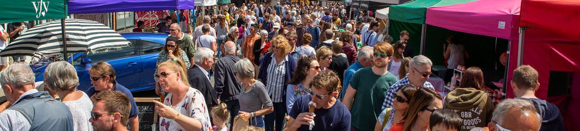 Shoppers in a busy town centre